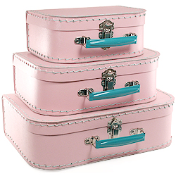 light pink paper suitcases