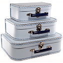 light blue paper suitcases